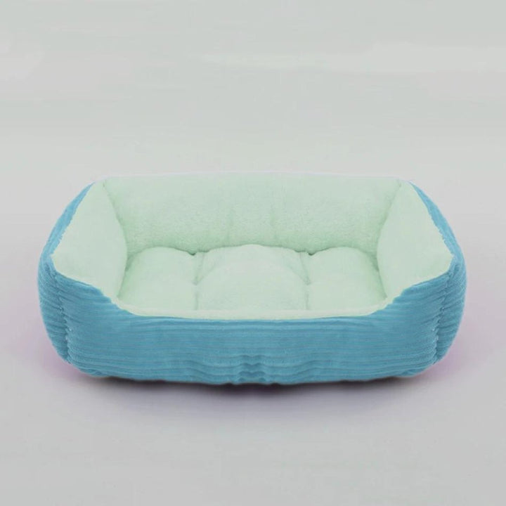 Relaxing plush dog bed in a neutral tone, designed for a cozy retreat and ultimate comfort for all dogs.