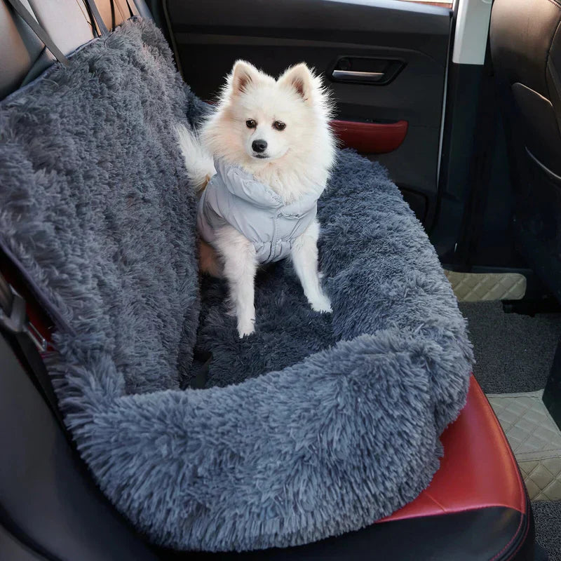 Dog travel bed, a plush car seat mattress offering canine comfort on the go.