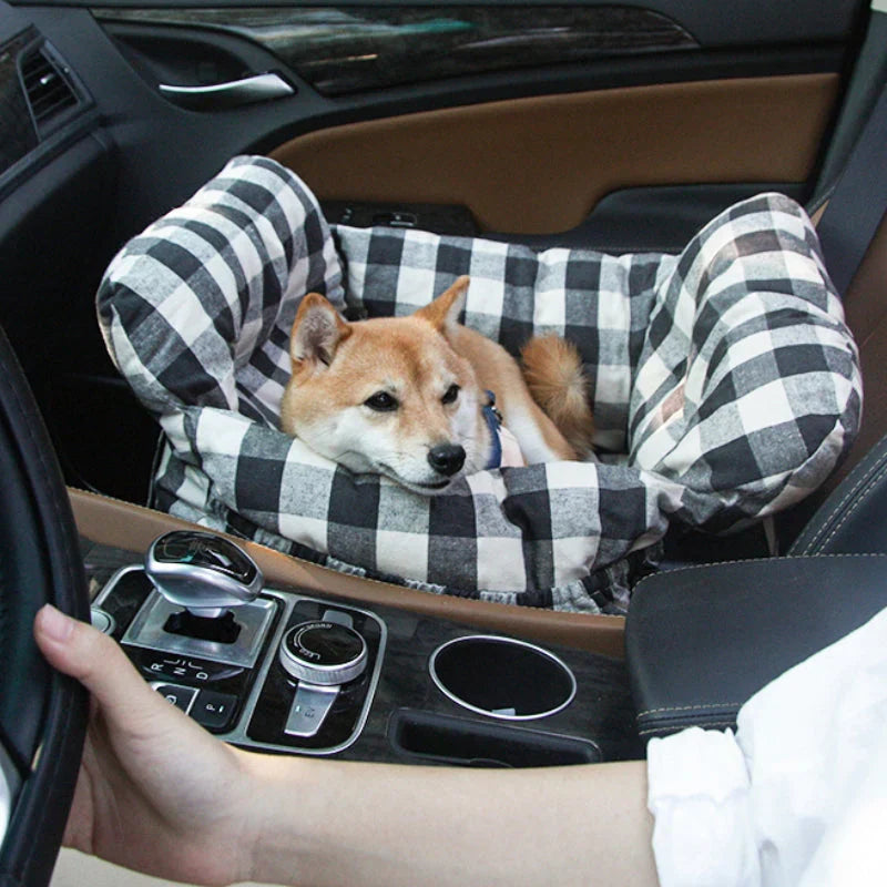Gray dog car seat with headrest, perfect for small pets, enhanced travel comfort.