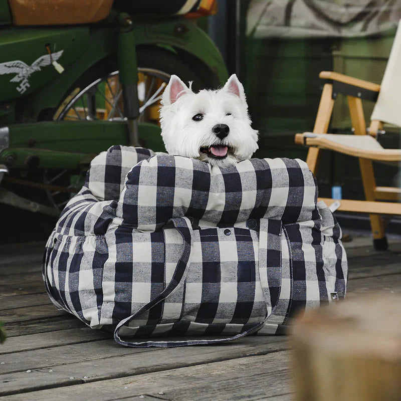 Portable dog car seat, compact and secure, ideal for daily commutes or trips.