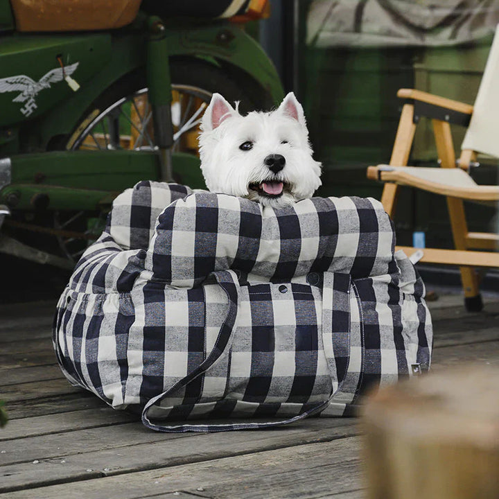 Portable dog car seat, compact and secure, ideal for daily commutes or trips.