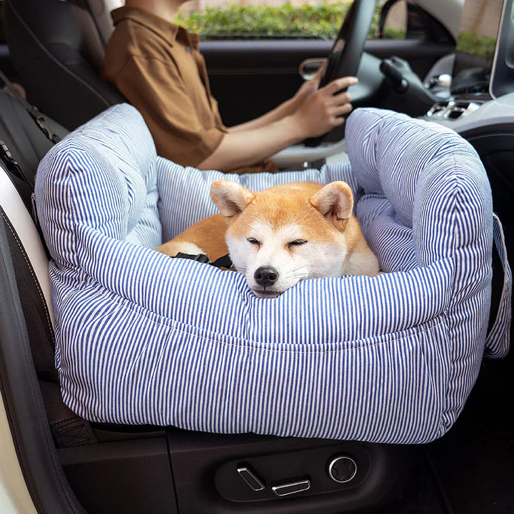 Cozy dog car seat for pet travel, durable grey fabric and secure clip.