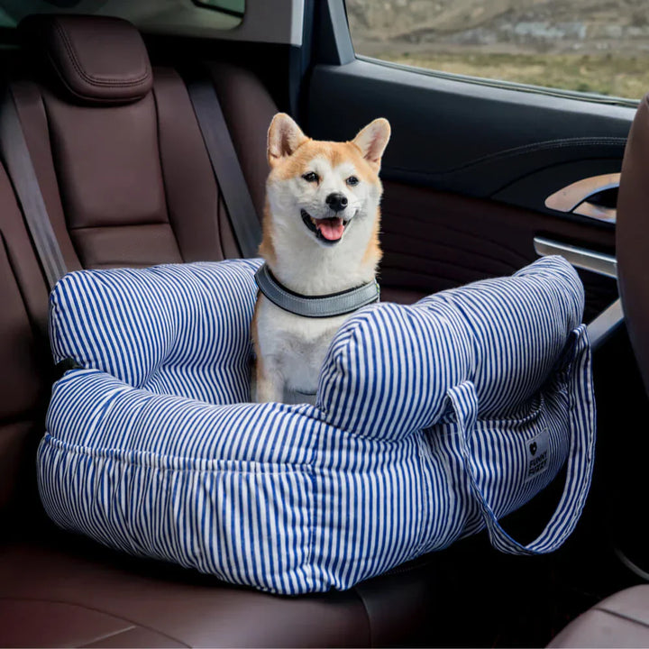 Comfortable dog car seat for safe pet travel, adjustable to fit vehicle seats.