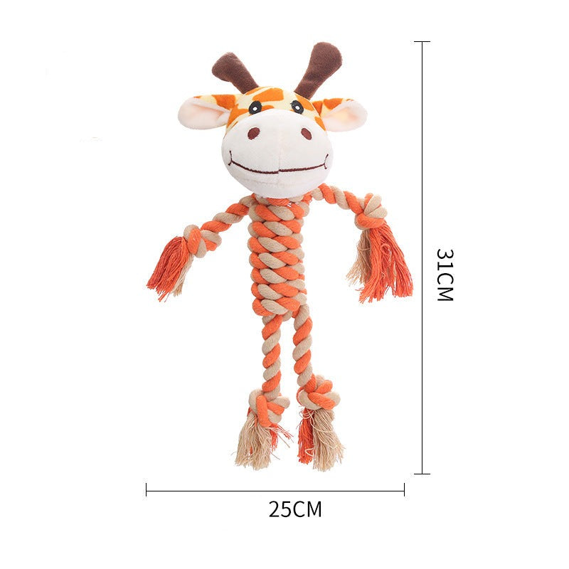 Smiling dog holding a durable plush squeaky chew toy, pet supplies essential