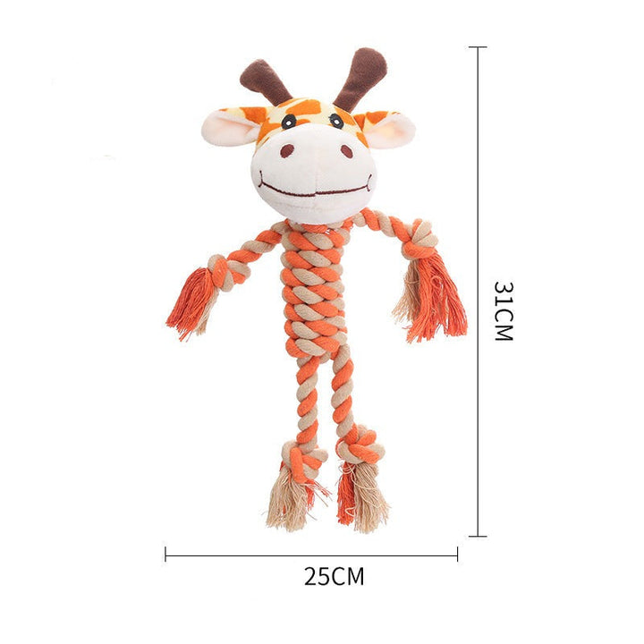 Smiling dog holding a durable plush squeaky chew toy, pet supplies essential