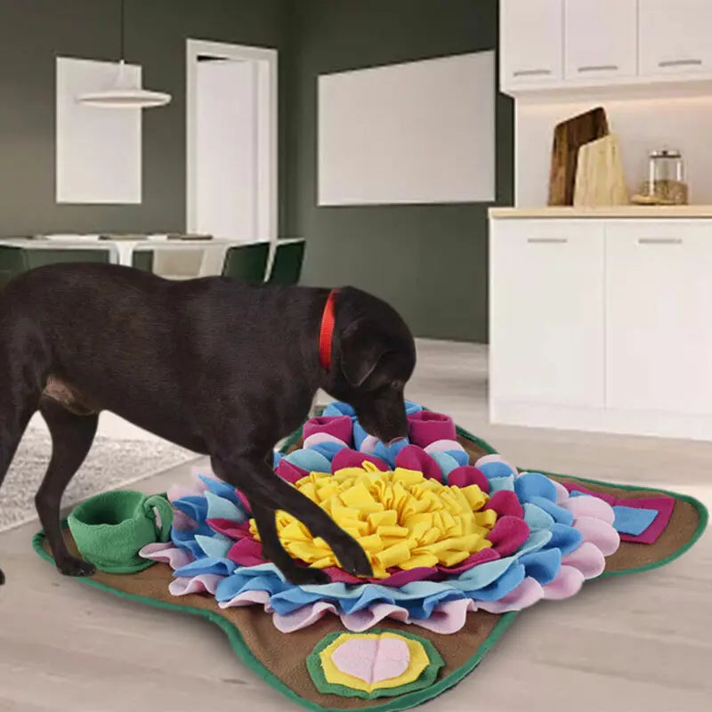 Portable and machine washable dog snuffle mat, a plush slow feeder toy for pet enrichment and mental stimulation.