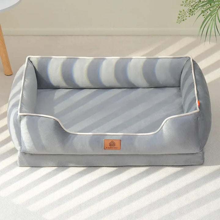 Comfortable pet sofa bed with thick orthopedic base and removable plush cushions, ideal for dogs