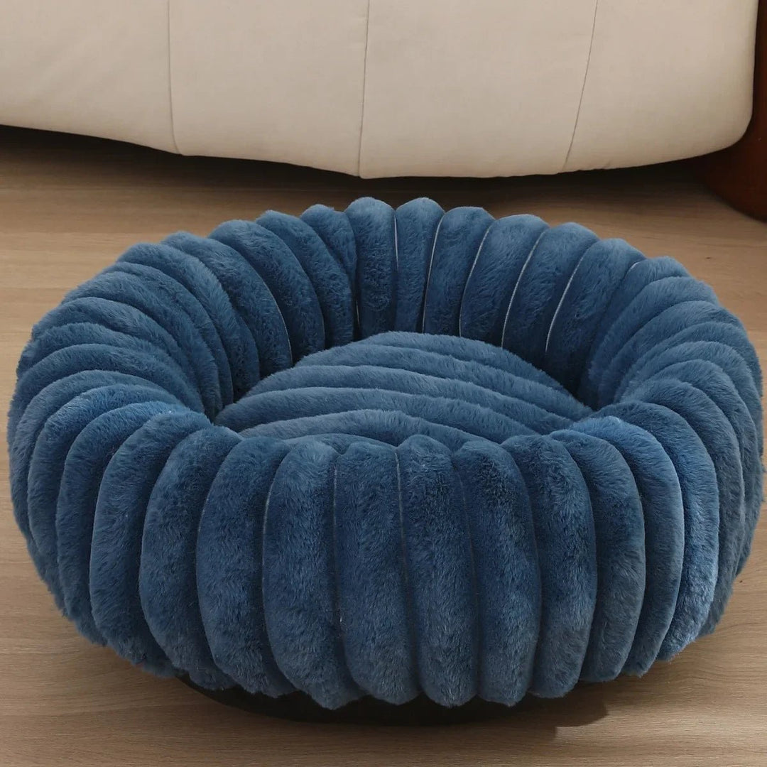 Stylish plush pet bed, donut shape, offering a secure and cozy space for medium dogs.