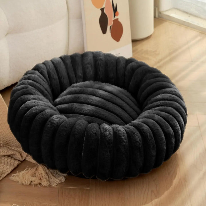 Orthopedic plush donut pet bed, providing joint support for small and medium breeds.