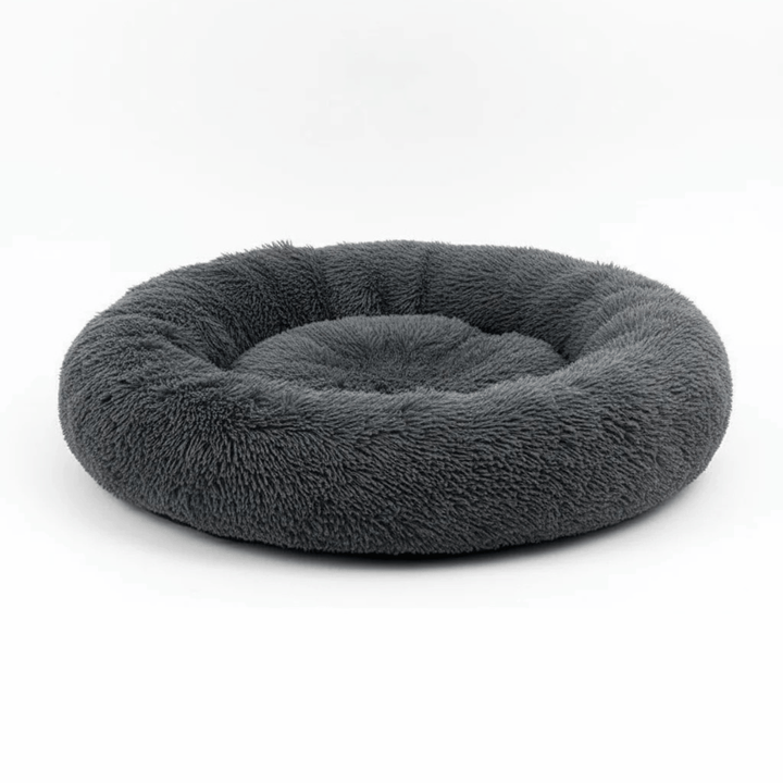 Comfortable dog donut bed in plush material, perfect for small to medium pets