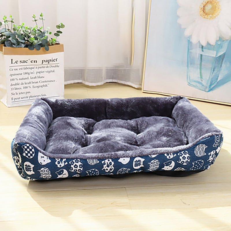 Plush fabric pet sofa bed for dogs, cozy gray bolster design, front view