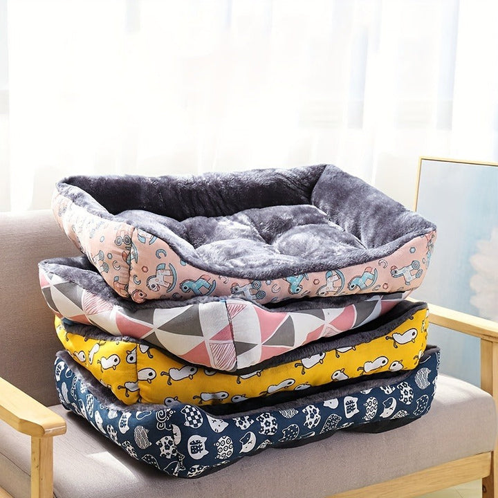 Stylish pet sofa bed, plush gray fabric with high bolsters, side view, durable design