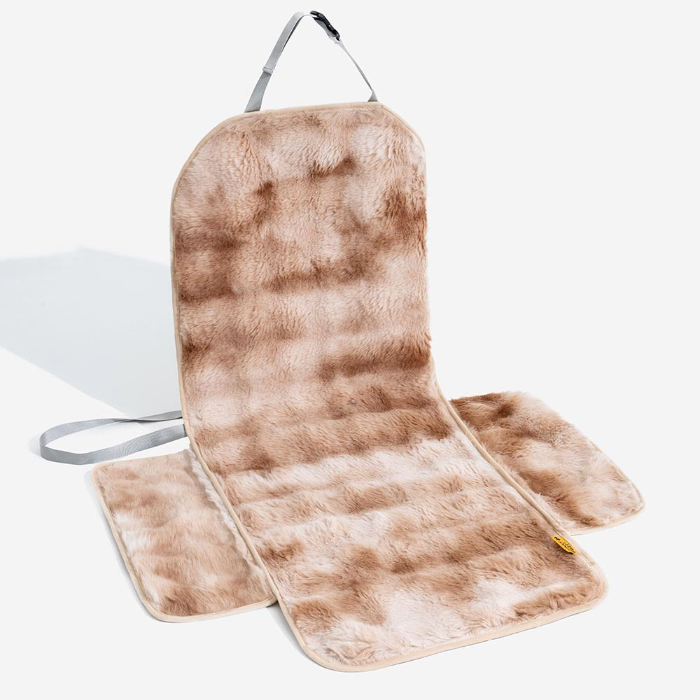 Luxurious faux fur pet car accessory, keeping car seats clean during cozy dog travels.