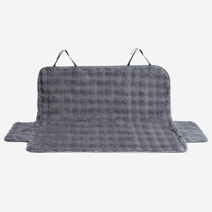 Non-slip pet car seat cover, securing your dog for a safe and cozy journey in the car.