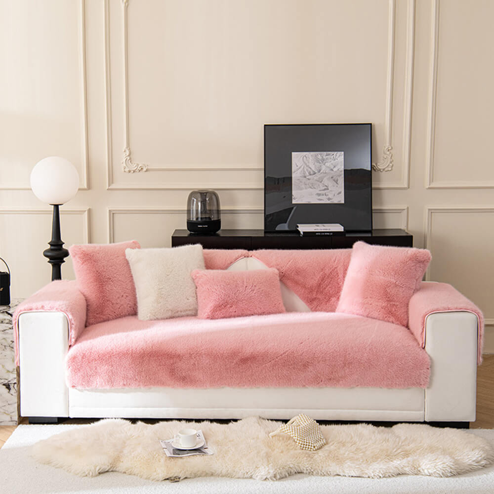 Modern home decor featuring a plush faux fur non-slip sofa cover on a contemporary couch.