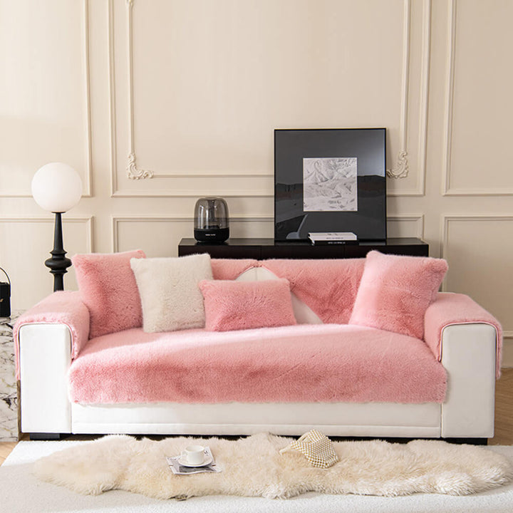 Modern home decor featuring a plush faux fur non-slip sofa cover on a contemporary couch.
