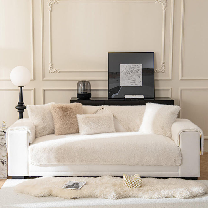 Close-up of plush faux fur texture on a non-slip couch cover, ideal for pet owners.