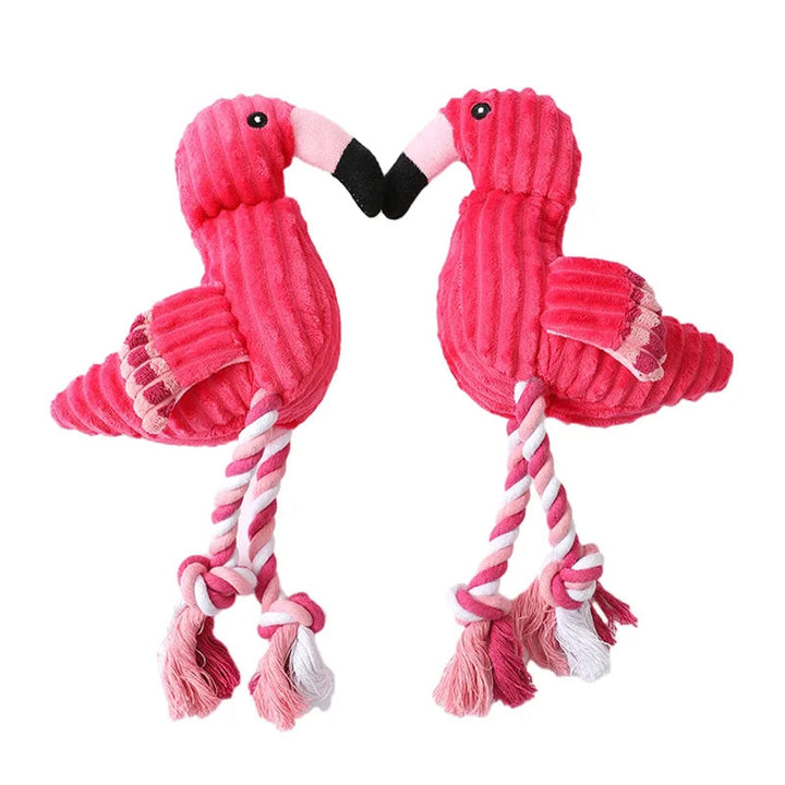 Interactive plush dog toy shaped like a pink flamingo, chewable for pet health