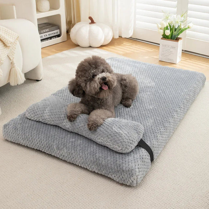 Unisex gray pet mat with integrated pillow, perfect for dog and cat comfort and anxiety reduction.
