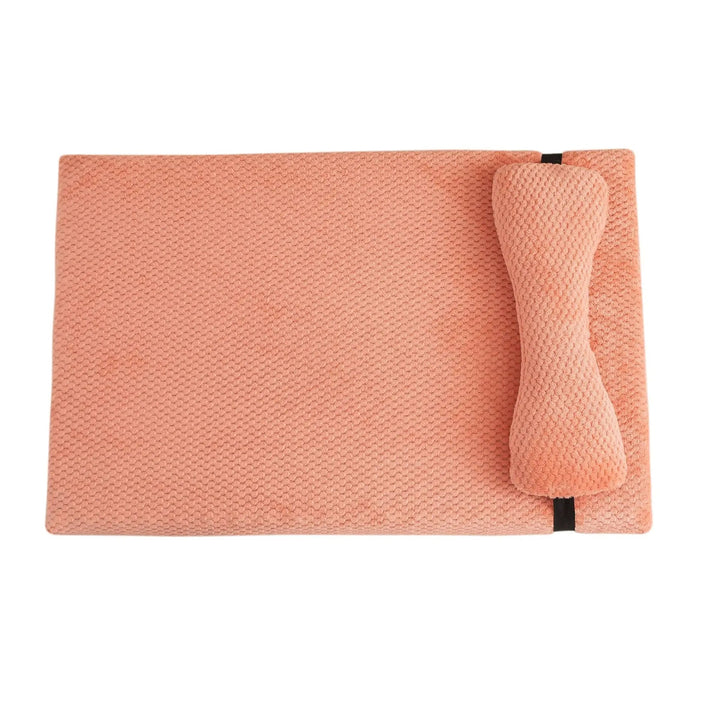 Comfortable plush dog bed with pillow, designed for anxiety relief and deep sleep.