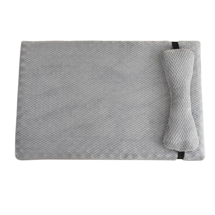 Durable and washable pet mat for cats and dogs, featuring a cozy pillow for head support.