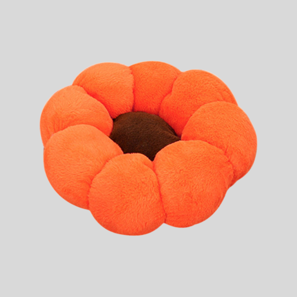 Cozy flower-shaped cat bed with plush petals, perfect for napping