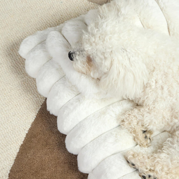Comfortable unisex plush pet bed, fluffy texture, excellent for calming restless dogs.