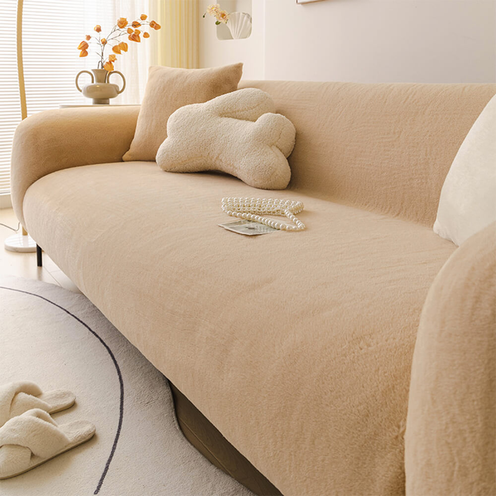 Soft touch plush couch protector, a full coverage slipcover offering skin-friendly comfort & defense.