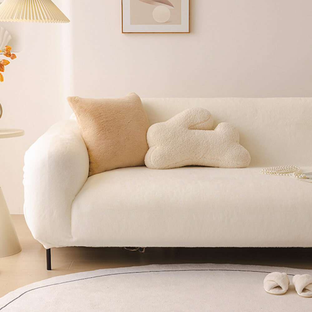 Machine washable full coverage sofa slipcover, plush and stretchable for easy furniture protection.