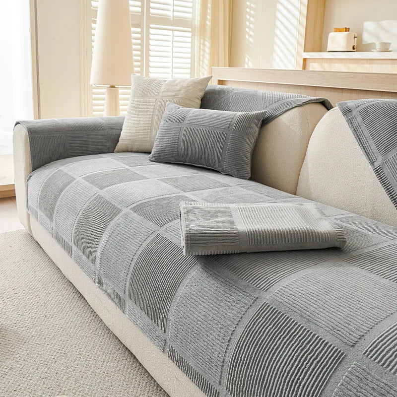 Plush geometric non-slip sofa cover in grey, offering all-season protection for a couch.
