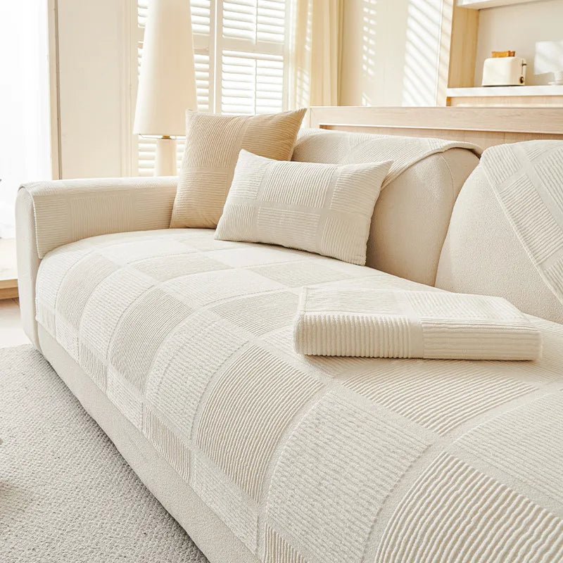 Versatile all-season plush geometric couch cover, non-slip and pet-friendly home decor solution.