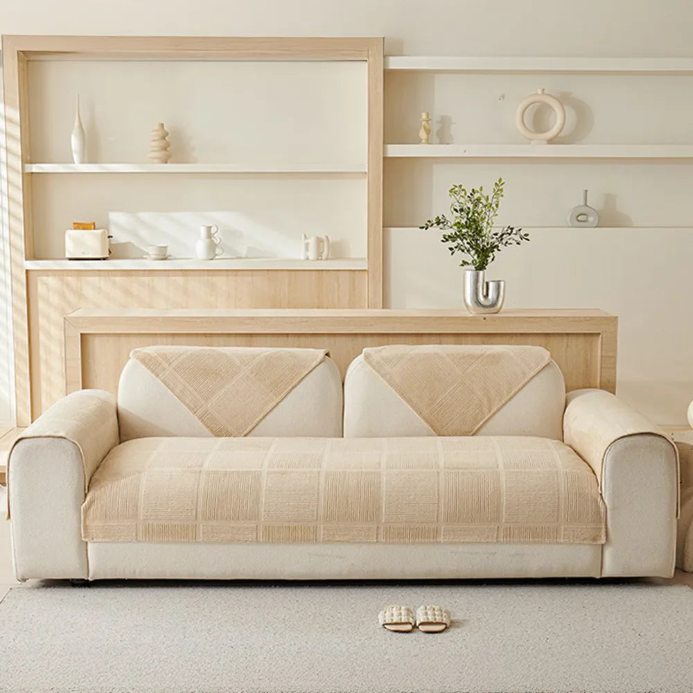 Modern geometric design plush couch cover, ensures non-slip fit and protects against wear and tear.