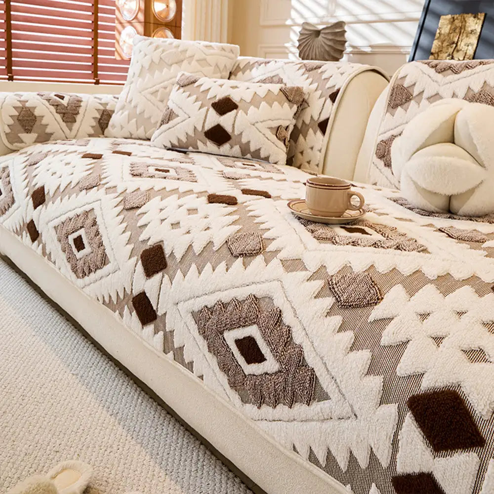 Pet-friendly non-slip plush geometric couch cover draped over a three-seater sofa.