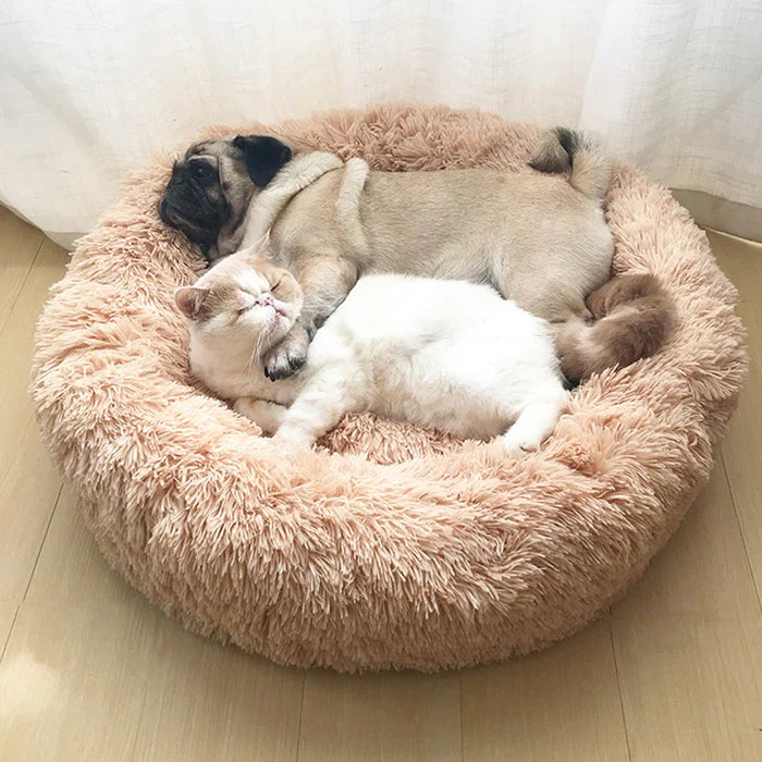 Plush grey anti-anxiety pet bed, round & soft, designed for deep sleep for dogs & cats.