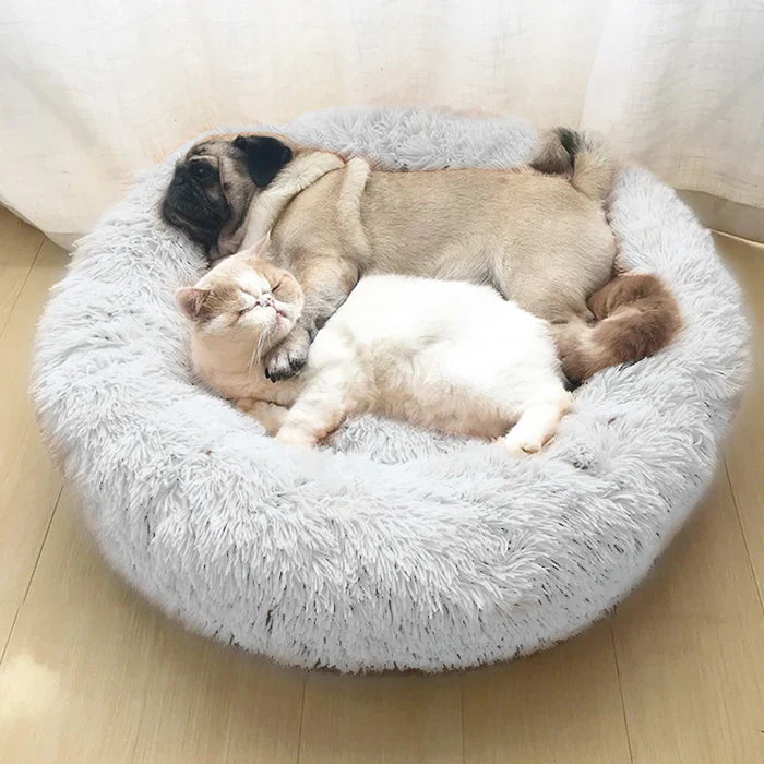 Pet bed, anti-anxiety, with a removable cover for washing, ensuring deep sleep hygiene.
