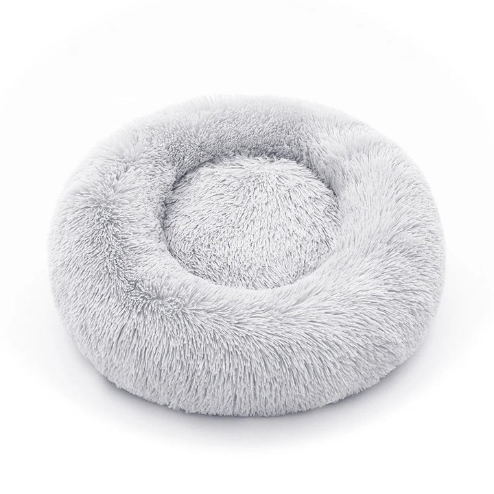 Round pet bed with high walls for a sense of security, anti-anxiety & deep sleep benefits.