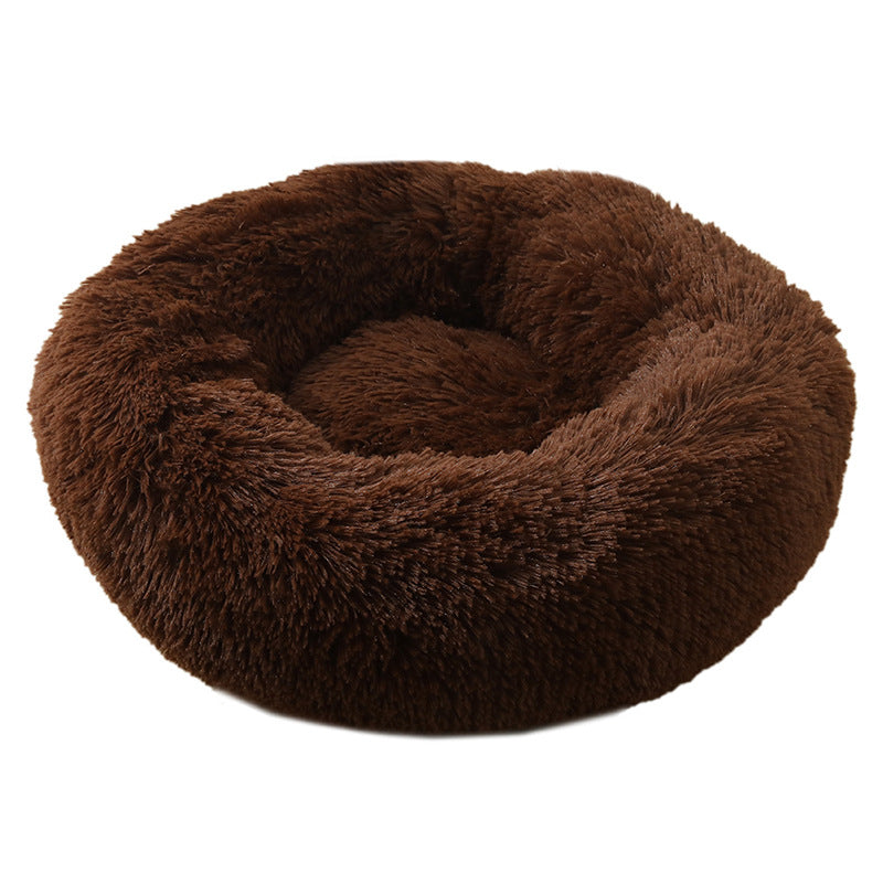 Calming pet bed, shown in packaging with deep sleep and anti-anxiety keywords.