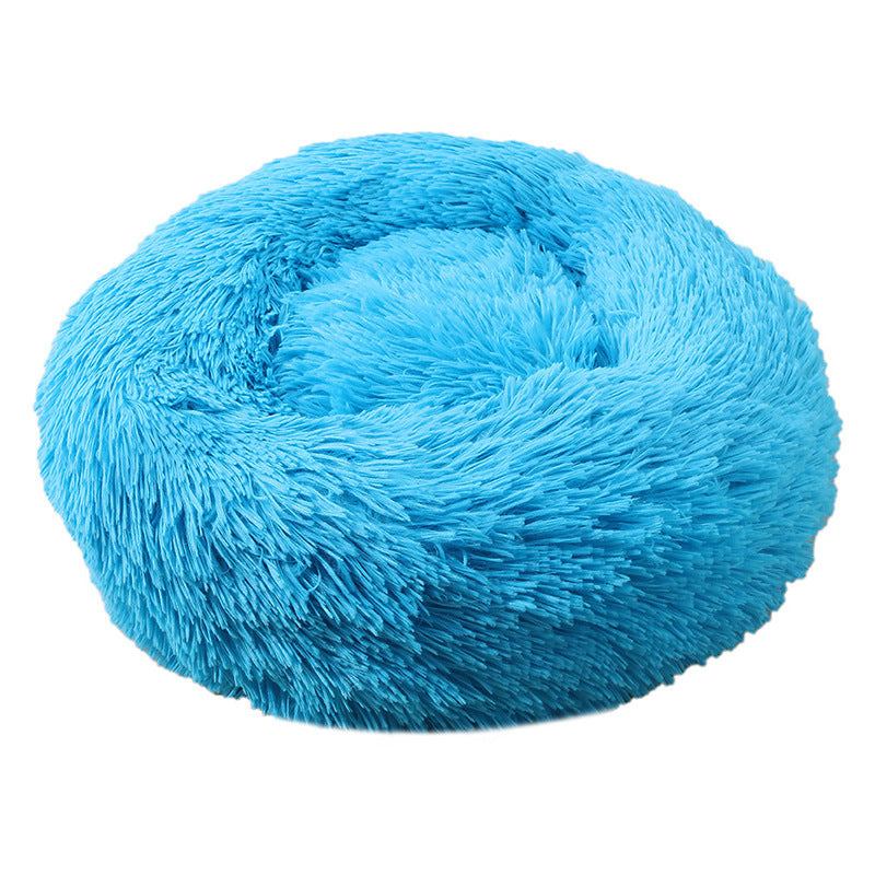 Child affectionately petting a dog in its anti-anxiety deep sleep pet bed, cozy scene.