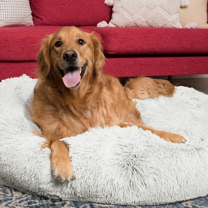 Washable anti-anxiety pet bed, easy to clean, ensures hygiene for deep sleeping pets.