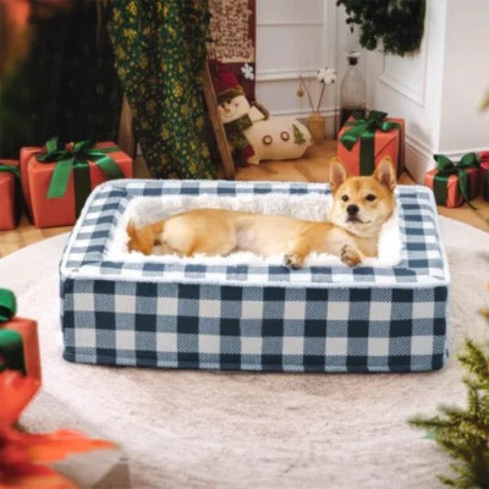 Brown orthopedic memory foam dog bed with raised rim, promoting anti-anxiety in pets