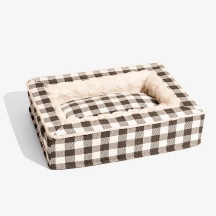 Stack of folded calming anti-anxiety memory foam dog beds, clearly showing thickness and quality