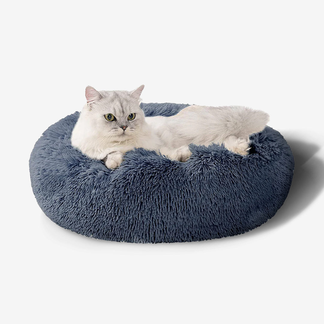 Soft pet comfort donut bed with non-slip bottom, perfect for cats