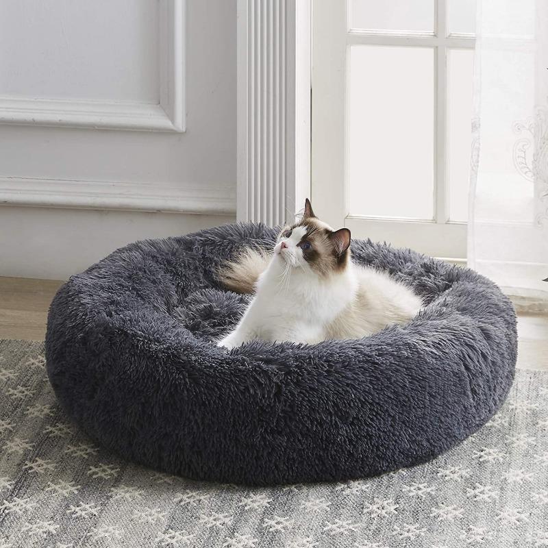 Machine washable calming cat bed, plush fabric, raised rim for security