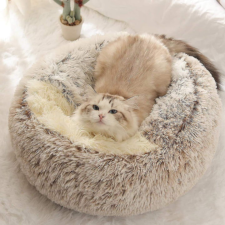 Empty plush cat nest bed, ready for a cozy pet to snuggle in for anxiety relief