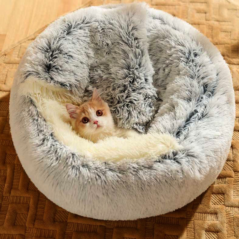 Top-down view of a round, soft cat bed, designed for anxiety relief and comfort