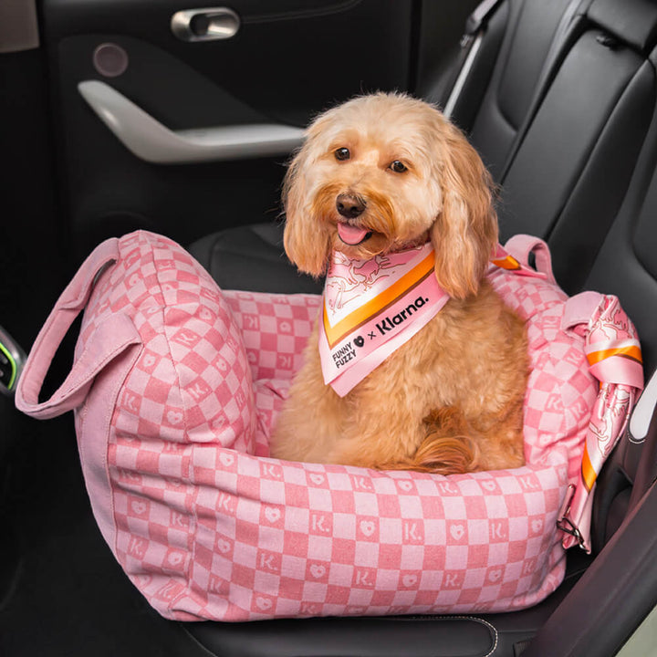 Side view of a raised dog car seat, providing a better view for pets during car safety travel.