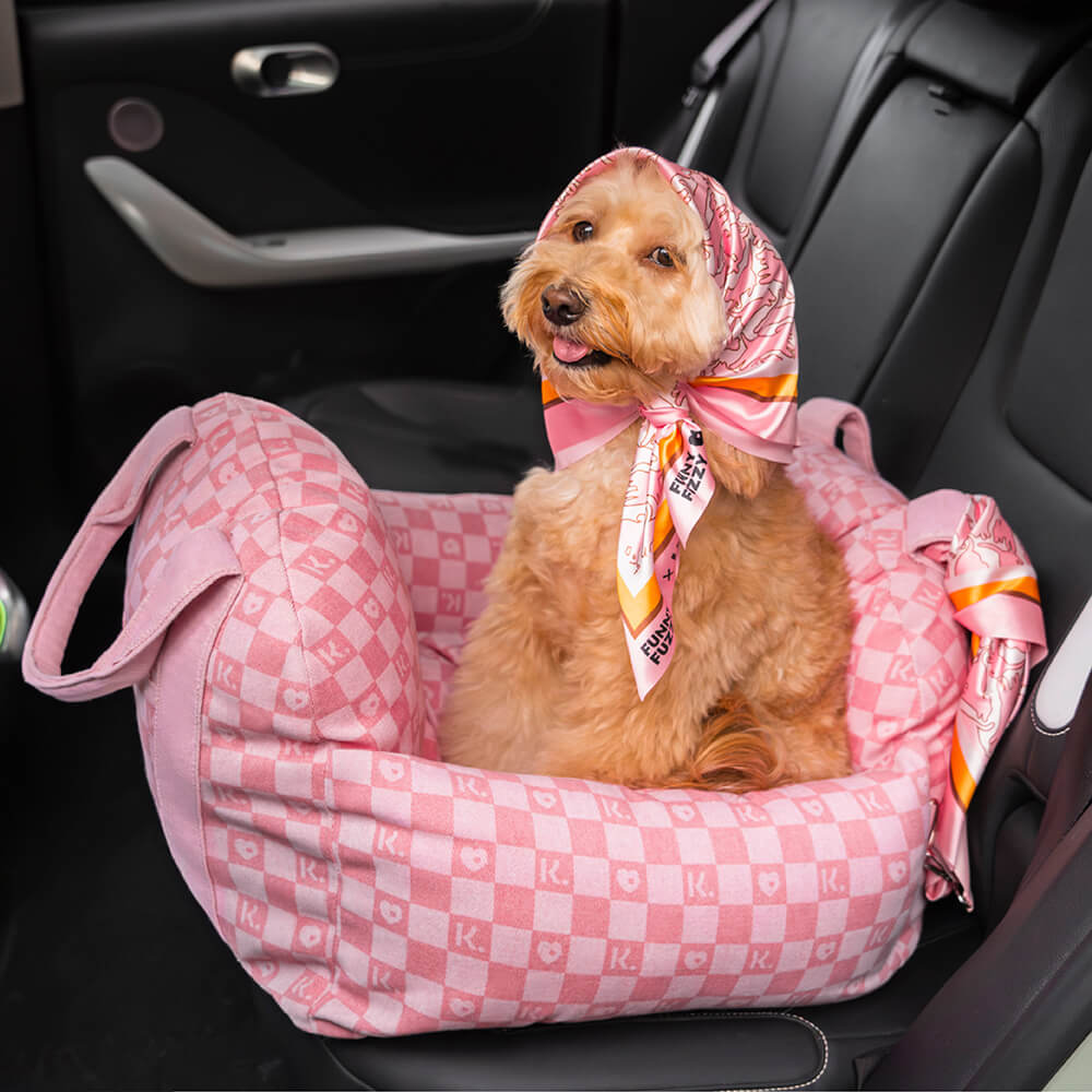 Dog car seat with an adjustable pet scarf, ensuring car safety and style for small dogs.