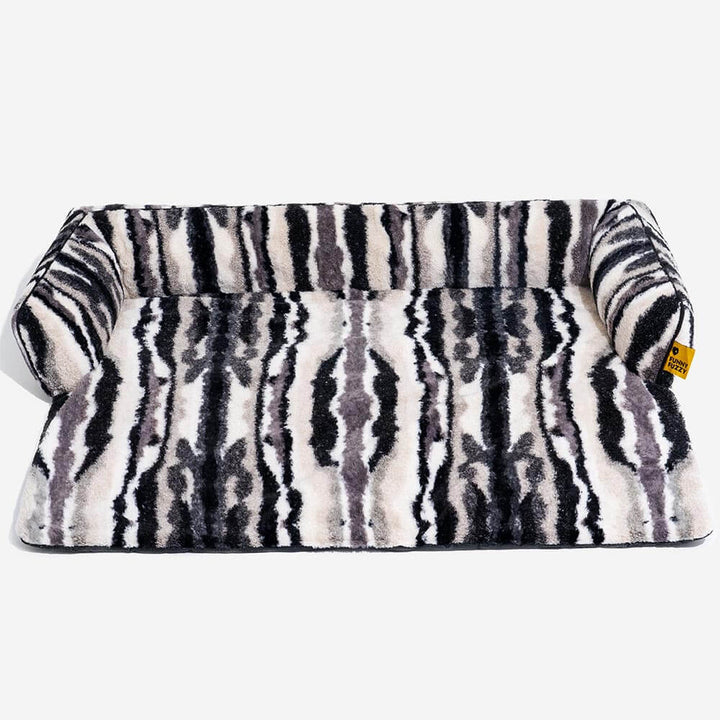 Soft texture of plush dog sofa protector, cozy pet bed for happy pets and protected furniture.