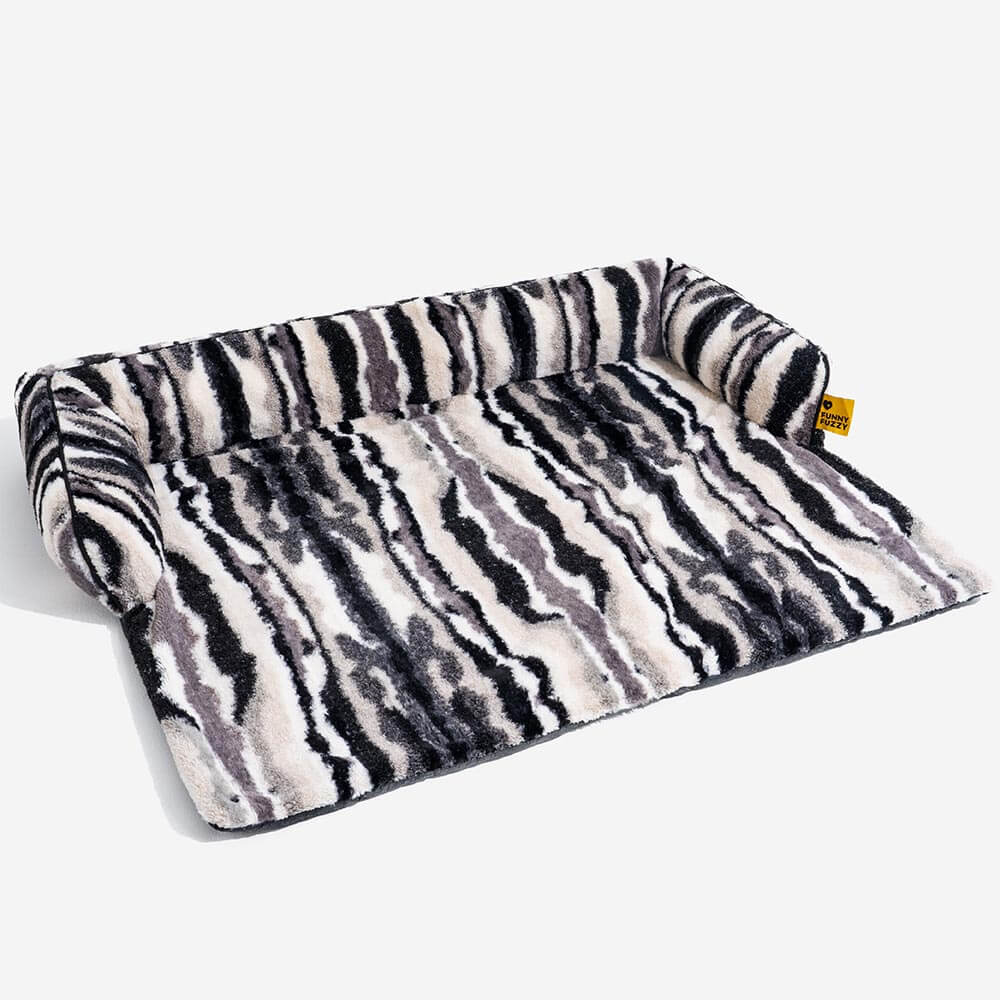Light grey plush pet sofa protector, durable and machine washable for easy maintenance.