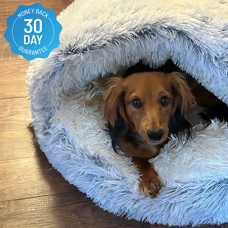 Overview of a calming pet bed, made from soft faux fur, designed to alleviate pet anxiety, comfort.